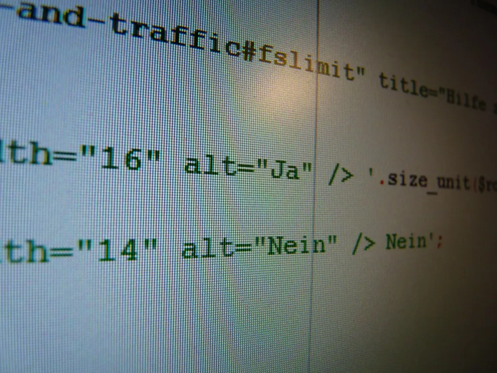 Close-up of HTML source code on a screen